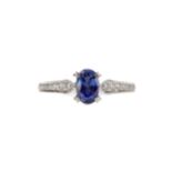 A SAPPHIRE AND DIAMOND RING