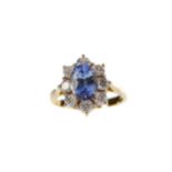 A SAPPHIRE AND DIAMOND RING