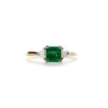 AN EMERALD AND DIAMOND RING