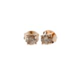 A PAIR OF DIAMOND STUD EARRINGS