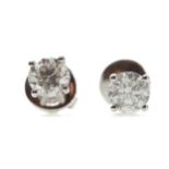 A PAIR OF DIAMOND STUD EARRINGS