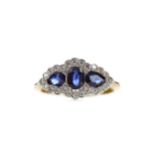 A SAPPHIRE AND DIAMOND RING