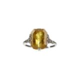 A YELLOW SAPPHIRE RING