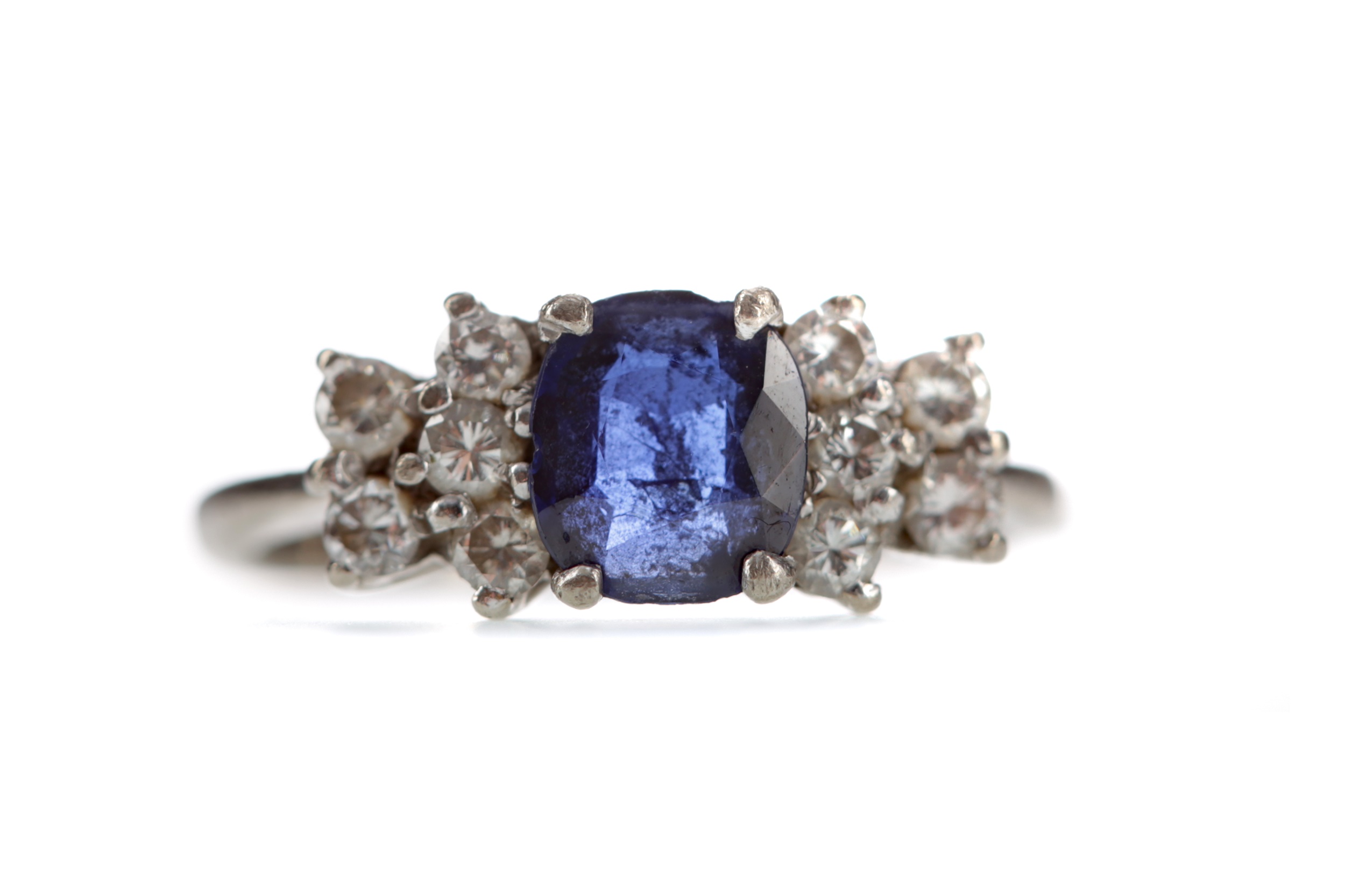 A BLUE GEM SET AND DIAMOND RING