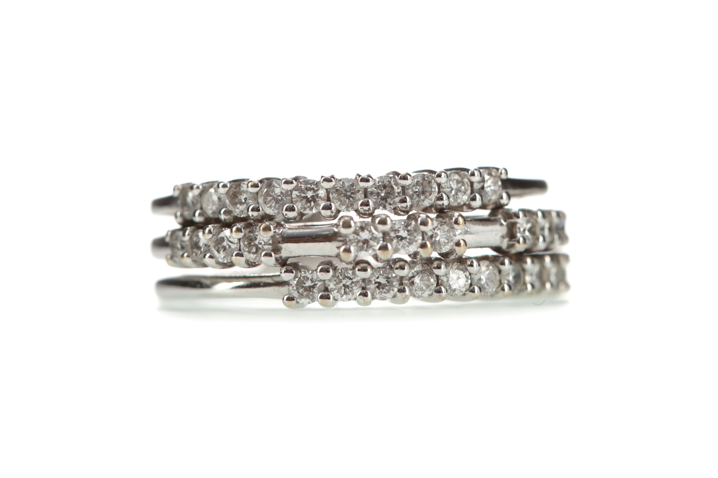 A THREE ROW DIAMOND RING