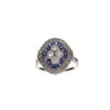 A SAPPHIRE AND DIAMOND RING