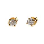 A PAIR OF DIAMOND STUD EARRINGS