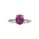 A PINK SAPPHIRE AND DIAMOND RING