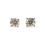 A PAIR OF DIAMOND STUD EARRINGS