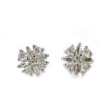 A PAIR OF DIAMOND CLUSTER EARRINGS