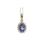 A TANZANITE AND DIAMOND PENDANT