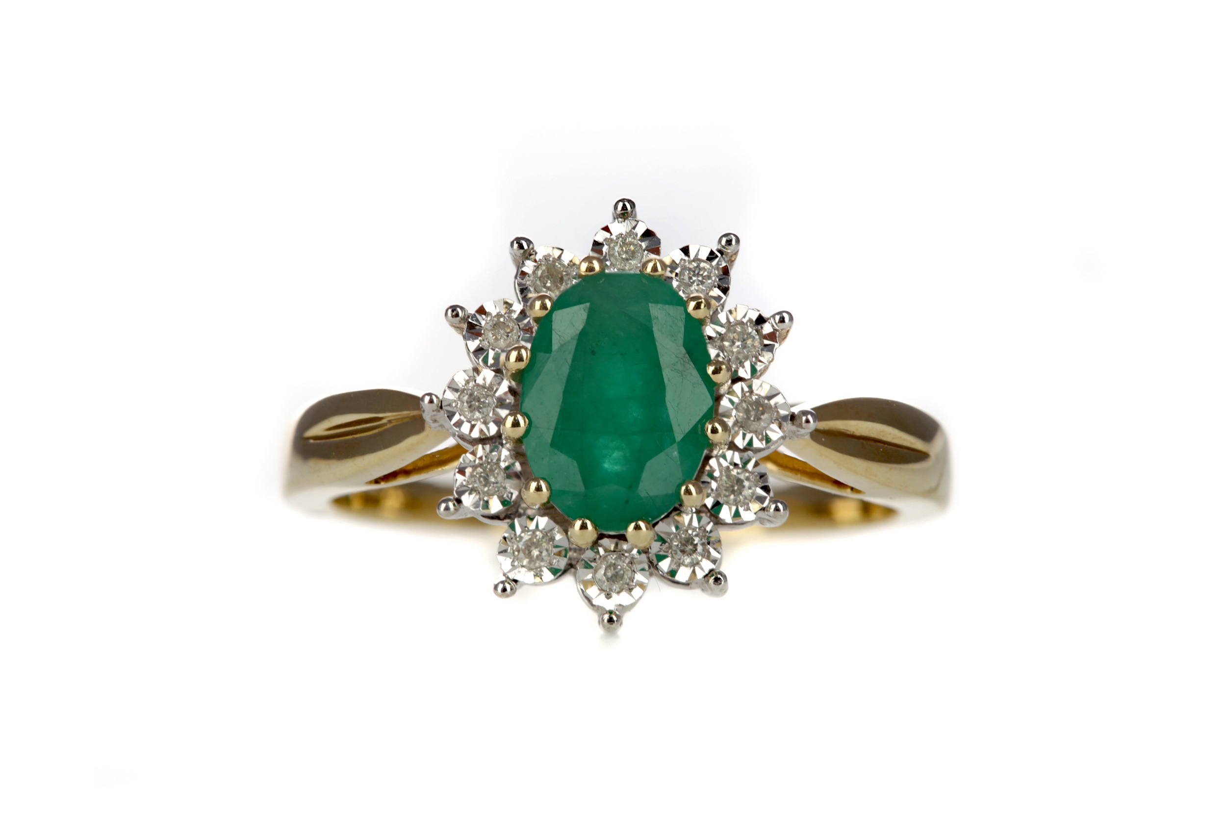 AN EMERALD AND DIAMOND RING