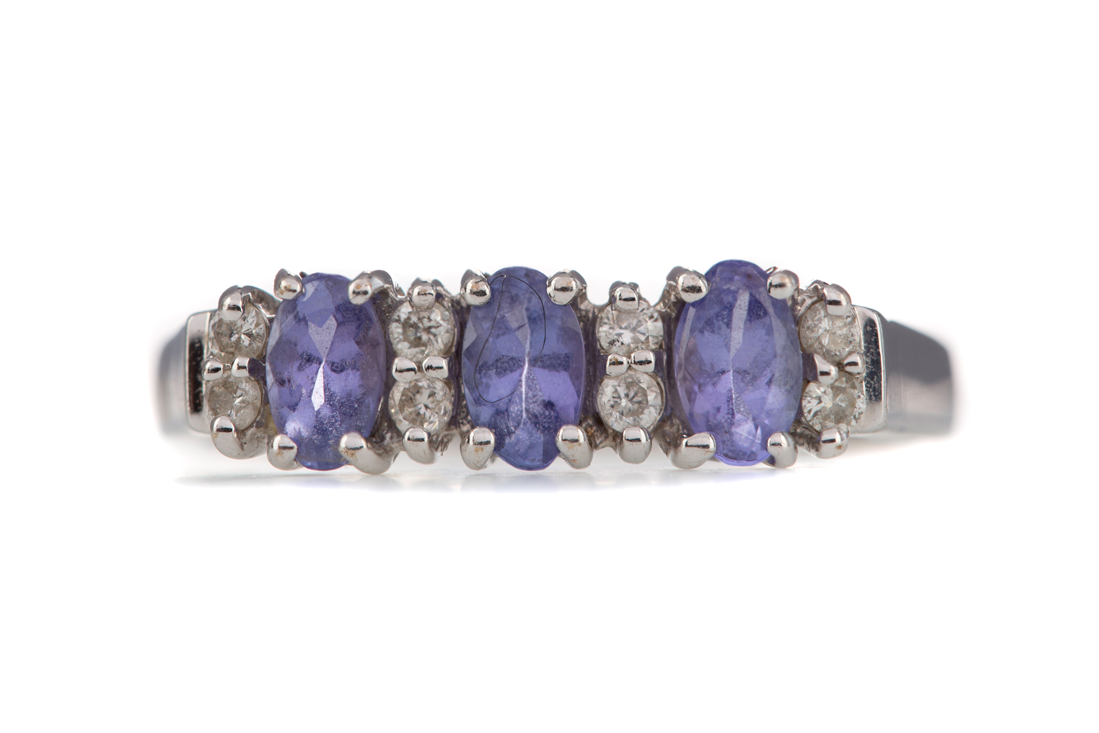 A TANZANITE AND DIAMOND RING