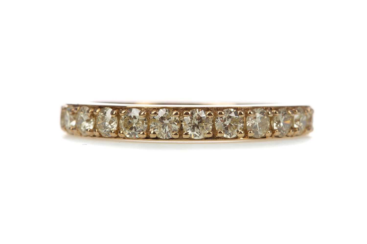 A DIAMOND HALF ETERNITY RING