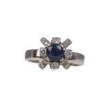 A SAPPHIRE AND DIAMOND RING