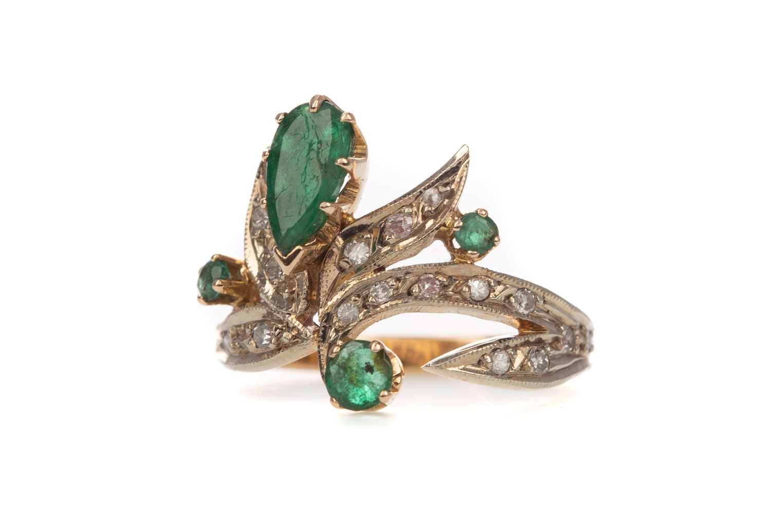 AN EMERALD AND DIAMOND RING