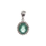 AN EMERALD AND DIAMOND PENDANT