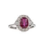 A CERTIFICATED TREATED RUBY AND DIAMOND RING