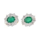 A PAIR OF EMERALD AND DIAMOND EARRINGS