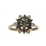 AN EMERALD AND DIAMOND RING