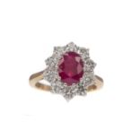 A CERTIFICATED TREATED RUBY AND DIAMOND RING