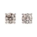 A PAIR OF DIAMOND STUD EARRINGS