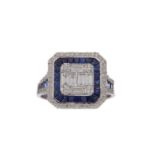 A SAPPHIRE AND DIAMOND RING