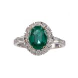 A CERTIFICATED EMERALD AND DIAMOND RING