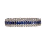 A SYNTHETIC SAPPHIRE AND DIAMOND BRACELET