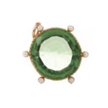 A GREEN GEM AND PEARL PENDANT