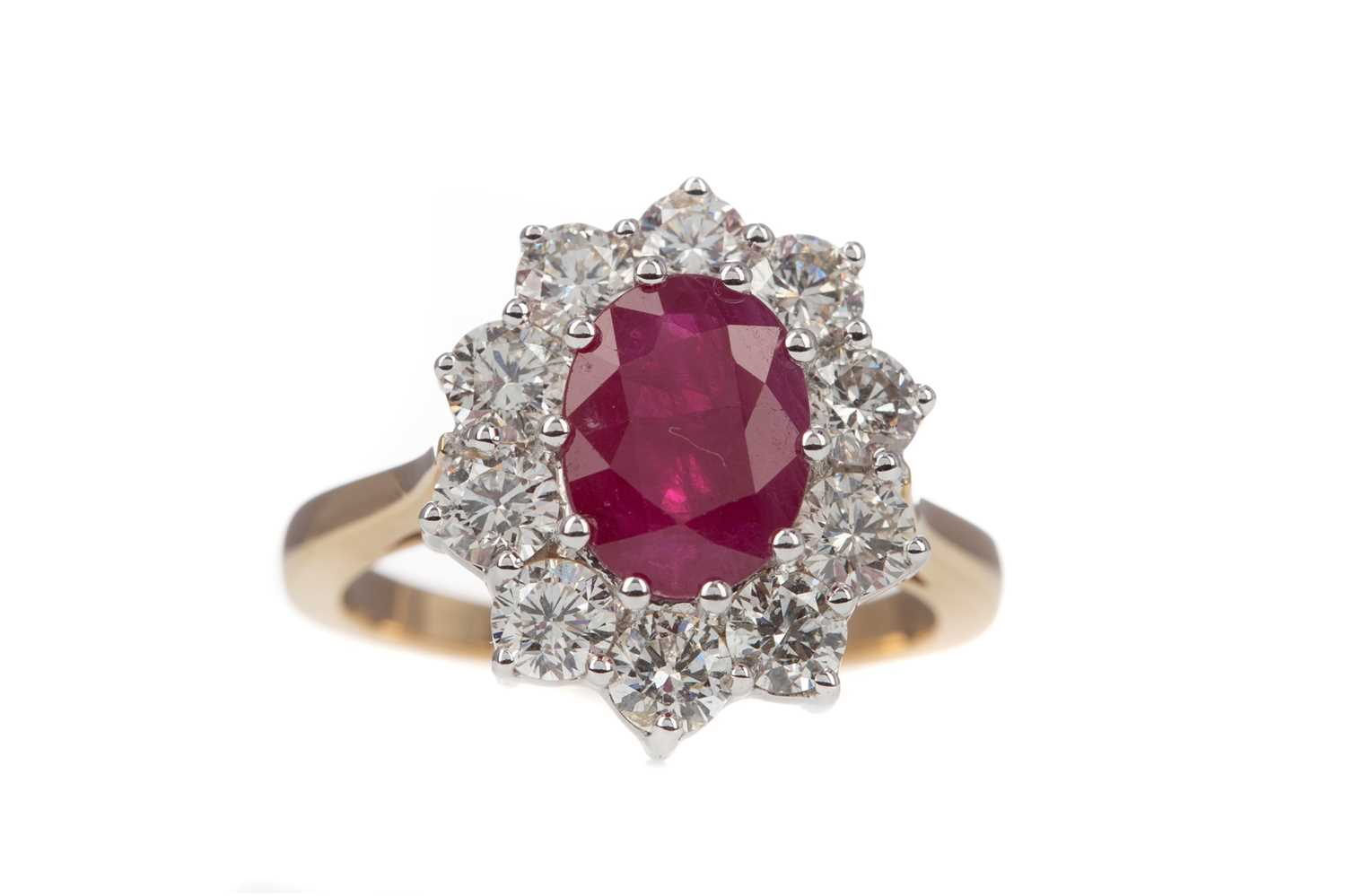 A CERTIFICATED TREATED RUBY AND DIAMOND RING