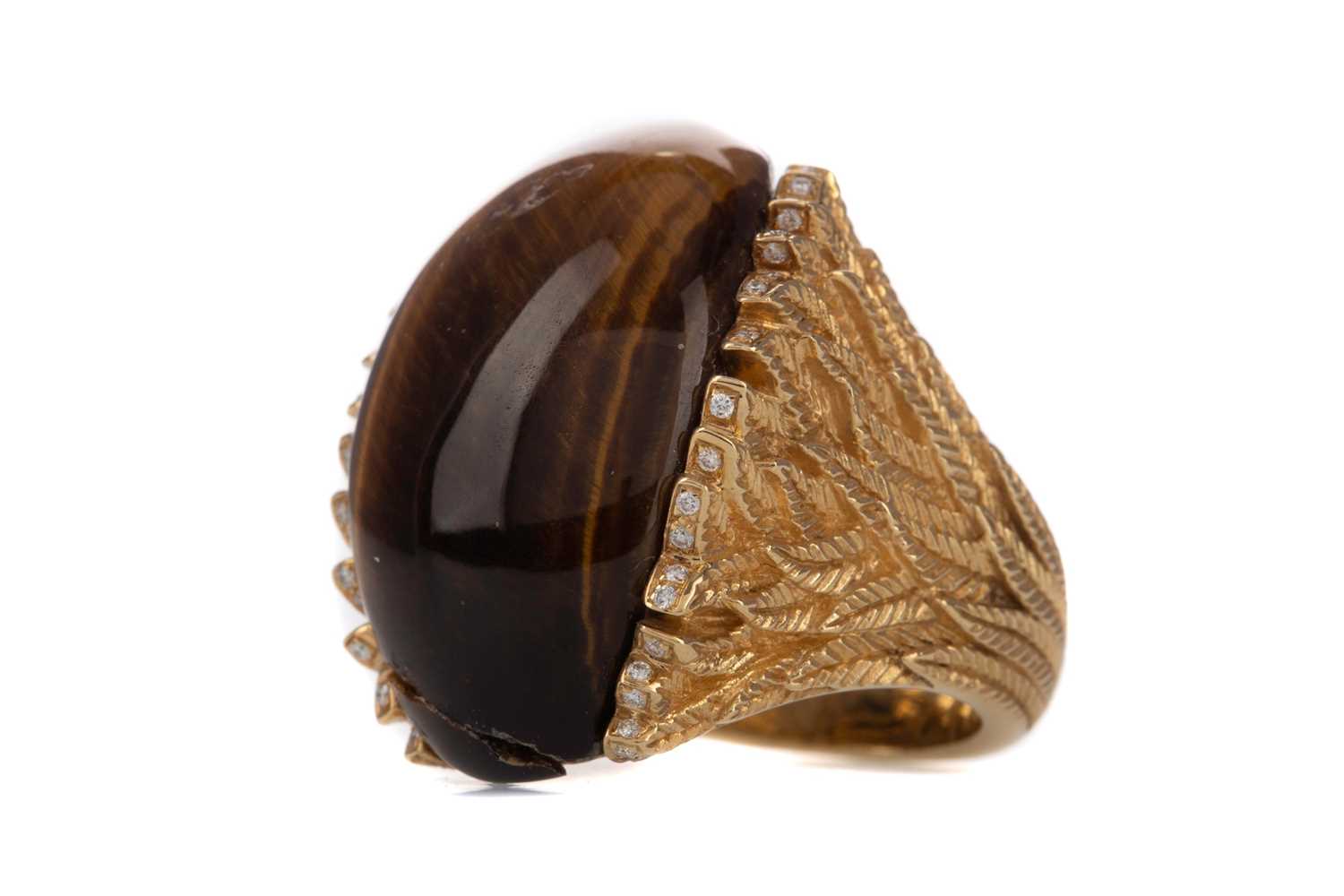 A TIGERS EYE AND DIAMOND RING