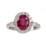 A CERTIFICATED TREATED RUBY AND DIAMOND RING