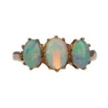 AN OPAL THREE STONE RING