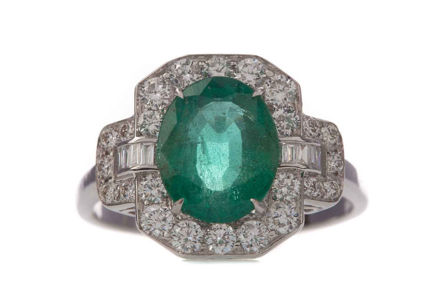 AN EMERALD AND DIAMOND RING