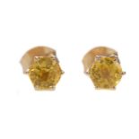 A PAIR OF YELLOW SAPPHIRE STUD EARRINGS