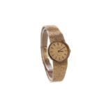 A LADY'S OMEGA NINE CARAT GOLD MANUAL WIND WRIST WATCH