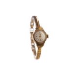 A LADY'S UNO NINE CARAT GOLD CASED MANUAL WIND WRIST WATCH