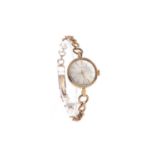 A LADY'S GARRARD NINE CARAT GOLD MANUAL WIND WRIST WATCH