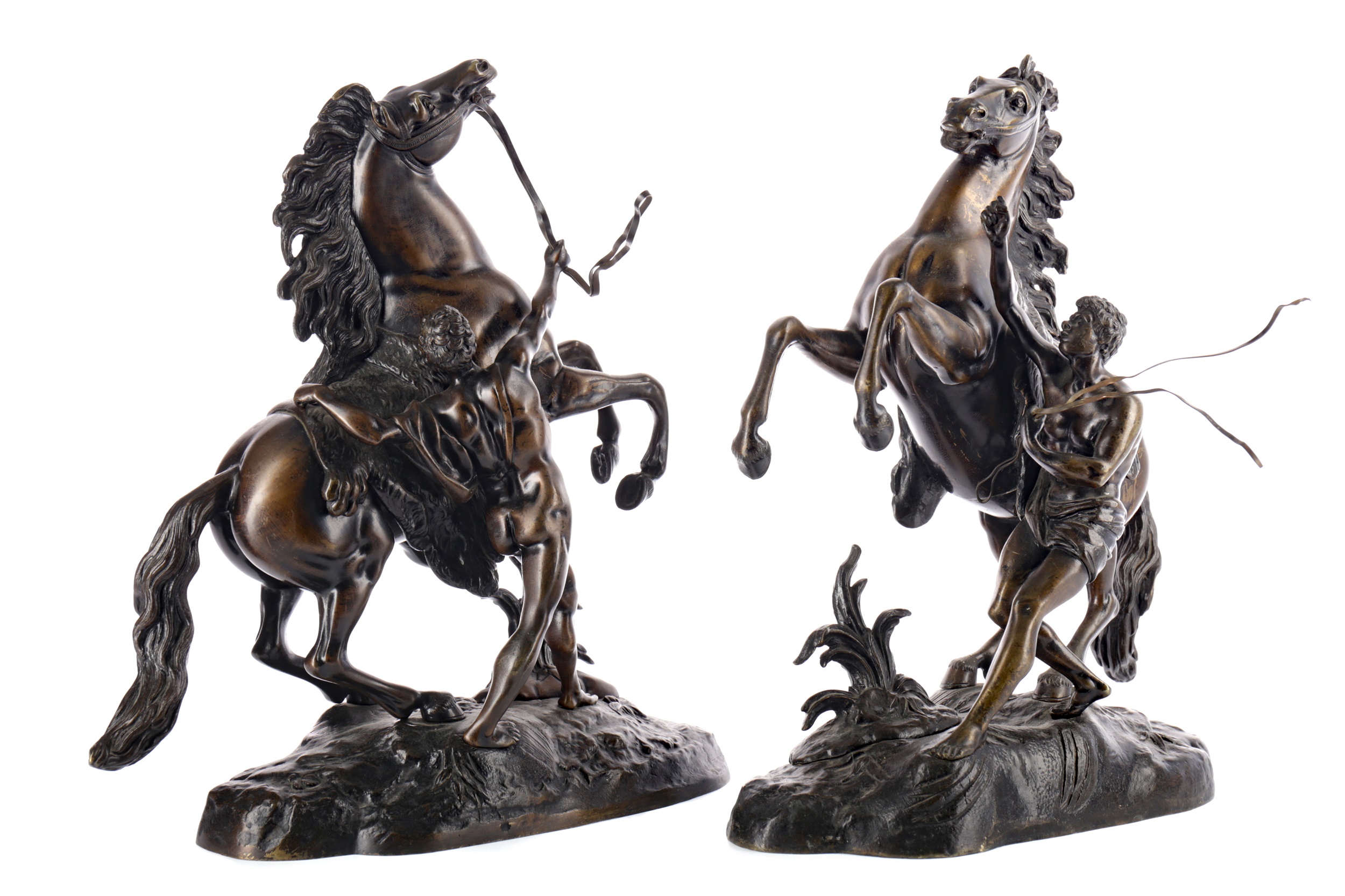 A PAIR OF VICTORIAN BRONZE MARLEY HORSES AFTER COUSTOU