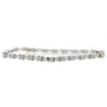 PRINCESS AND BAGUETTE CUT DIAMOND TENNIS BRACELET