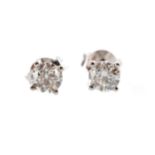 A PAIR OF DIAMOND STUD EARRINGS