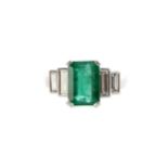 AN EMERALD AND DIAMOND RING