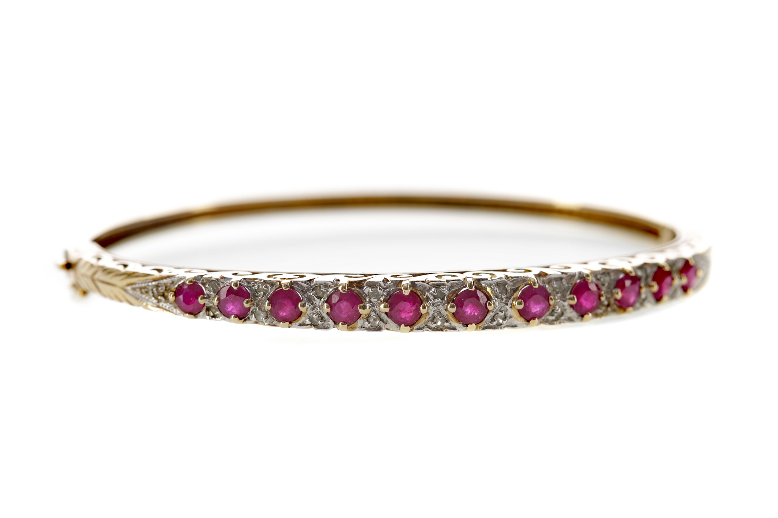 A RED GEM SET AND DIAMOND BANGLE