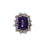 A TANZANITE AND DIAMOND RING