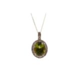 A PERIDOT AND DIAMOND PENDANT