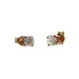 A PAIR OF DIAMOND STUD EARRINGS