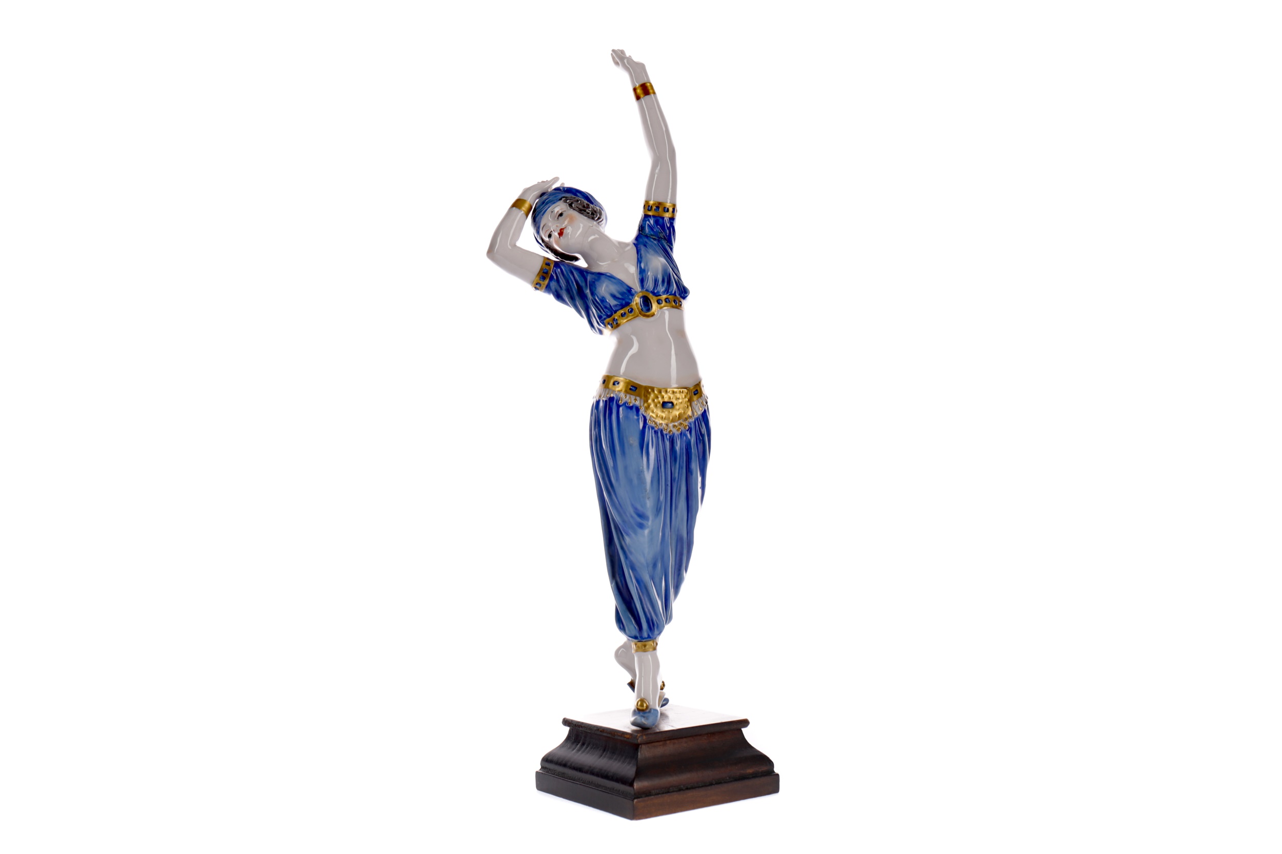 AN ART DECO PORCELAIN FIGURE OF A BELLY DANCER