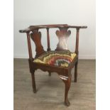 A GEORGE III MAHOGANY CORNER CHAIR