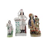 A COLLECTION OF THREE MID-19TH CENTURY STAFFORDSHIRE FLATBACK FIGURES